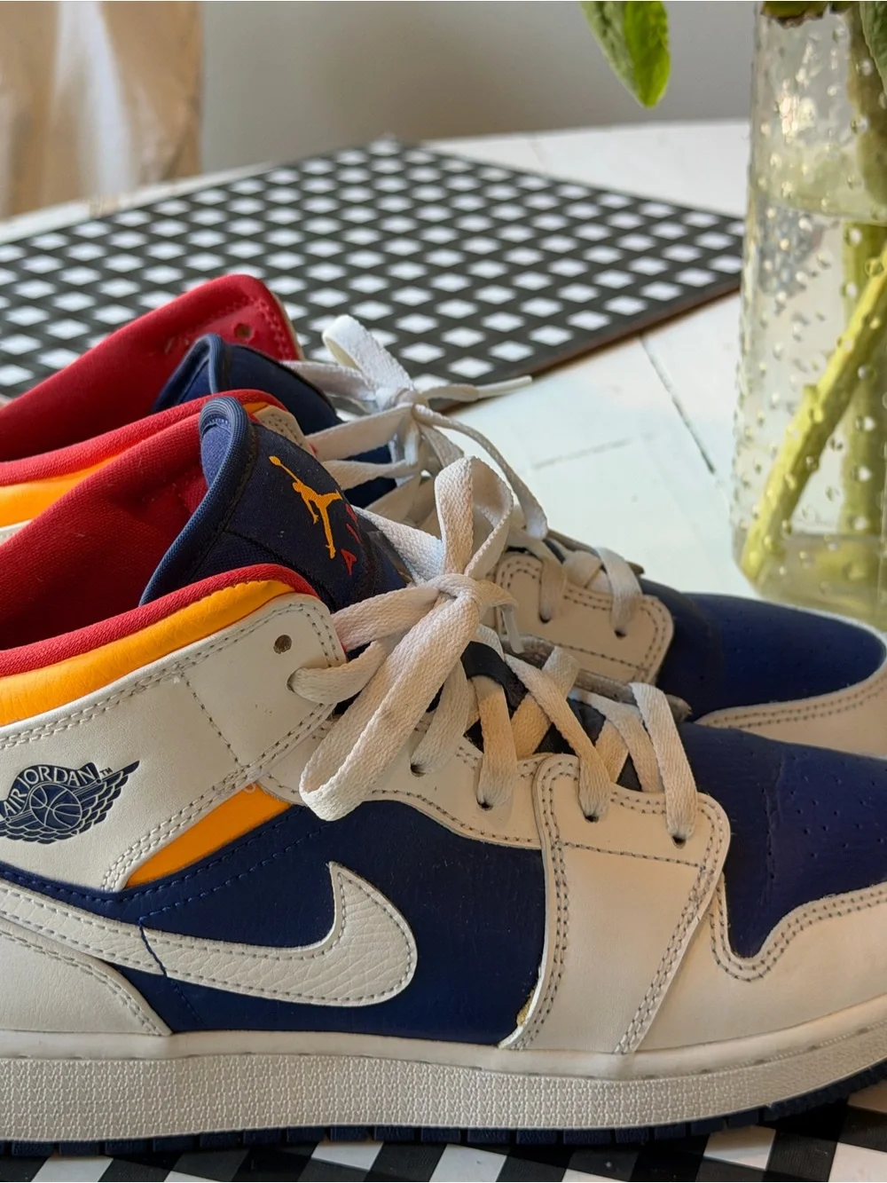Jordan 1 Mid Top Sneakers in Navy, White & Red